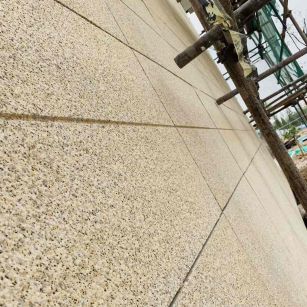 西宁 黄金麻花岗岩荔枝面外墙干挂石材效果示例