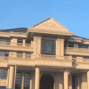 西宁黄金麻别墅外墙干挂石材效果示例