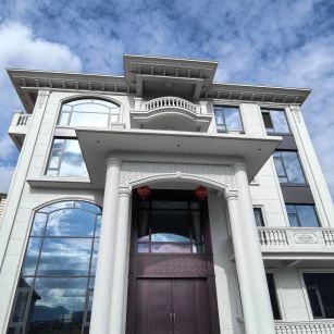 西宁白麻别墅外墙干挂石材效果示例