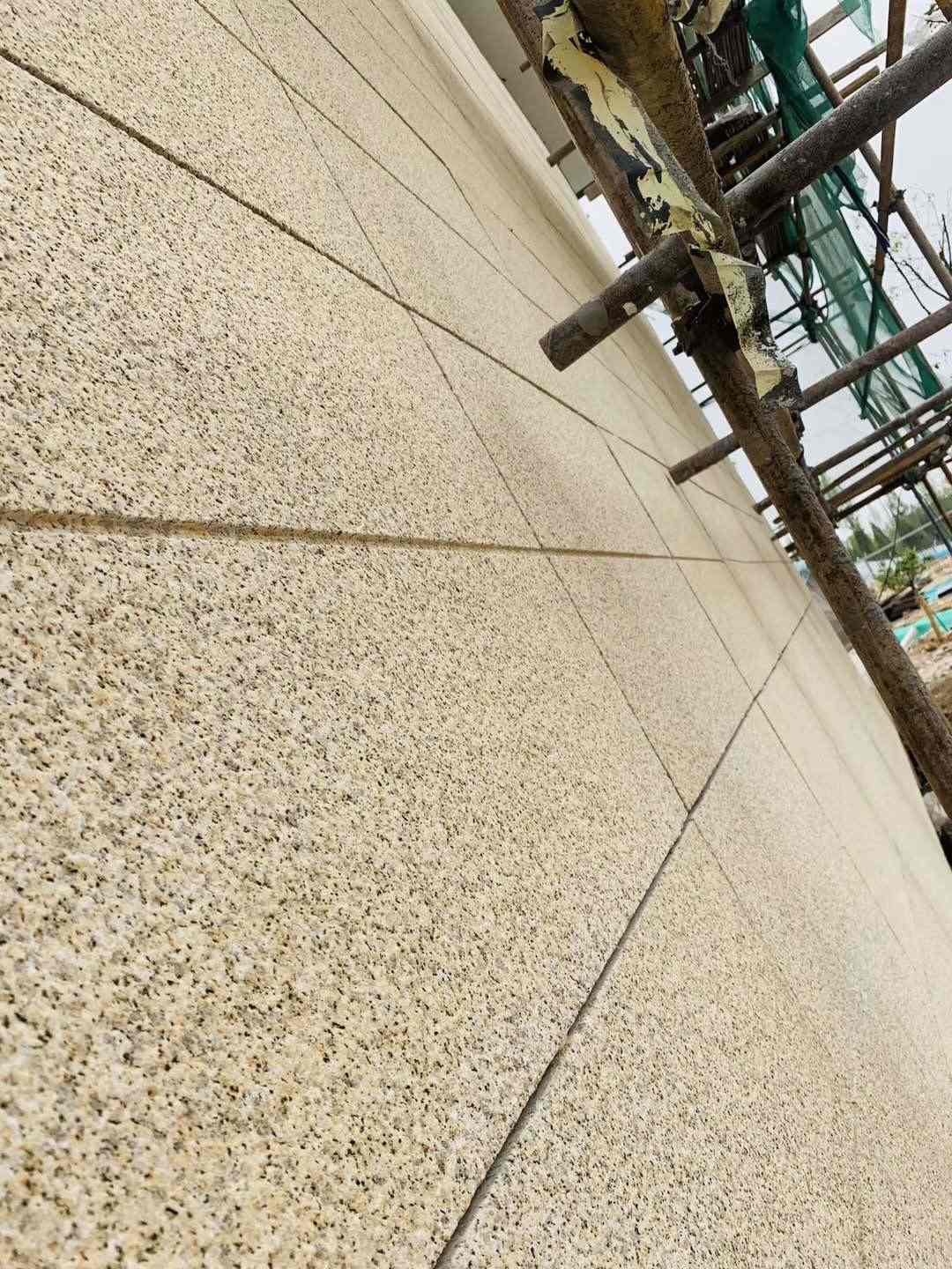 西宁 黄金麻花岗岩荔枝面外墙干挂石材效果示例